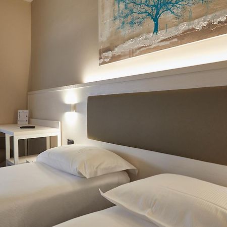קמראנו Hotel Concorde חדר תמונה