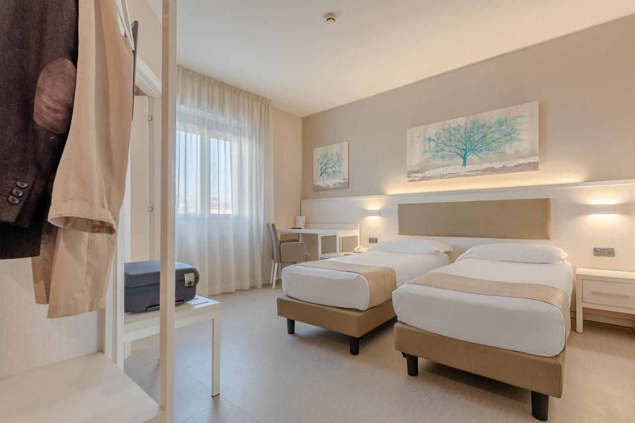 קמראנו Hotel Concorde חדר תמונה
